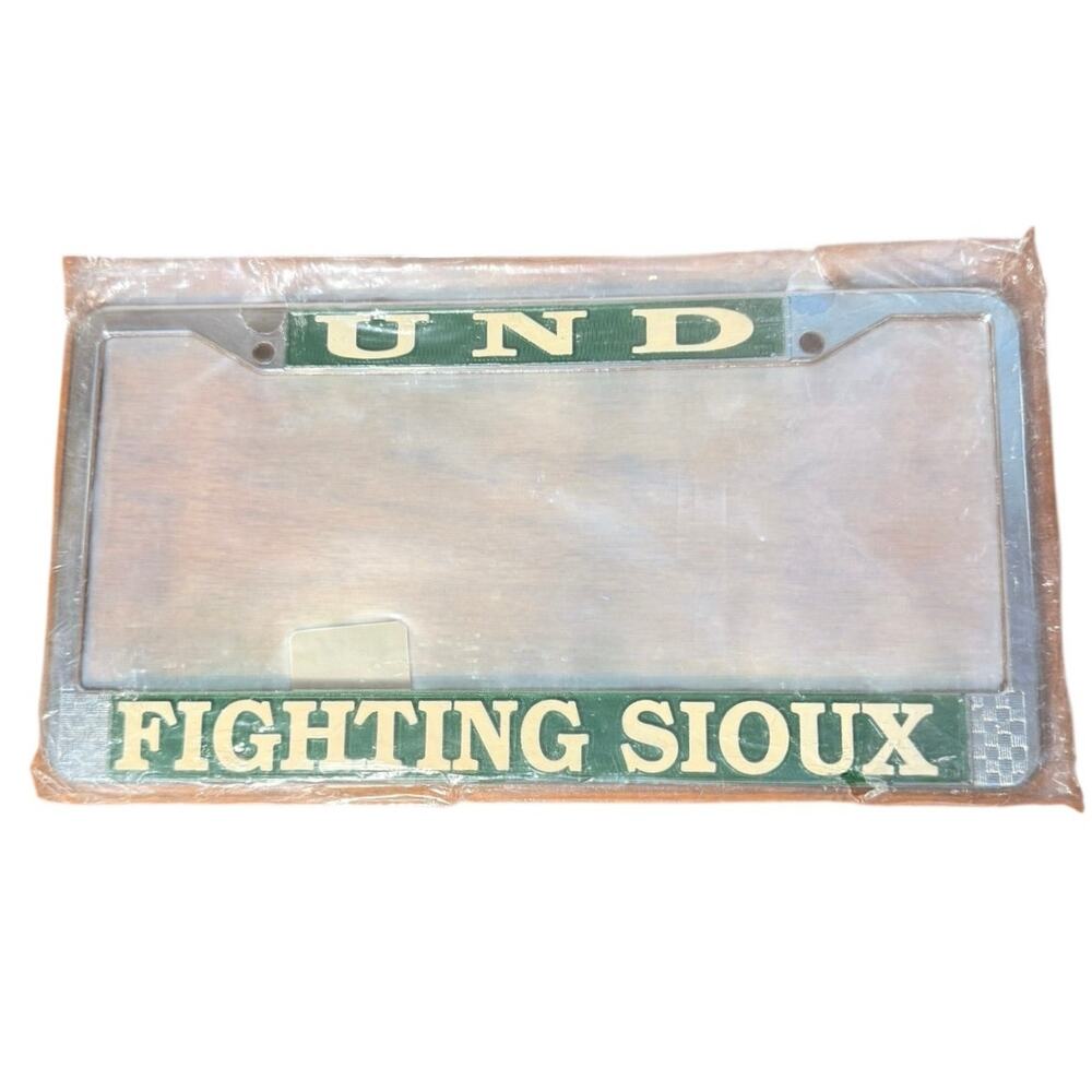 VTG UND Fighting Sioux Metal Chrome License Plate Frame North Dakota NEW SEALED